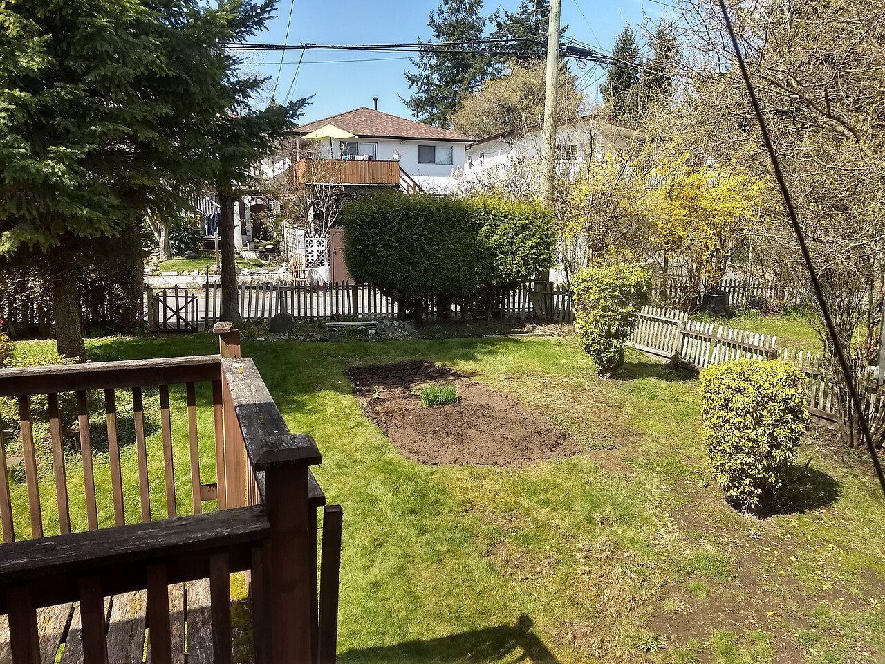 Backyard vegetable garden plot prepared for spring planting