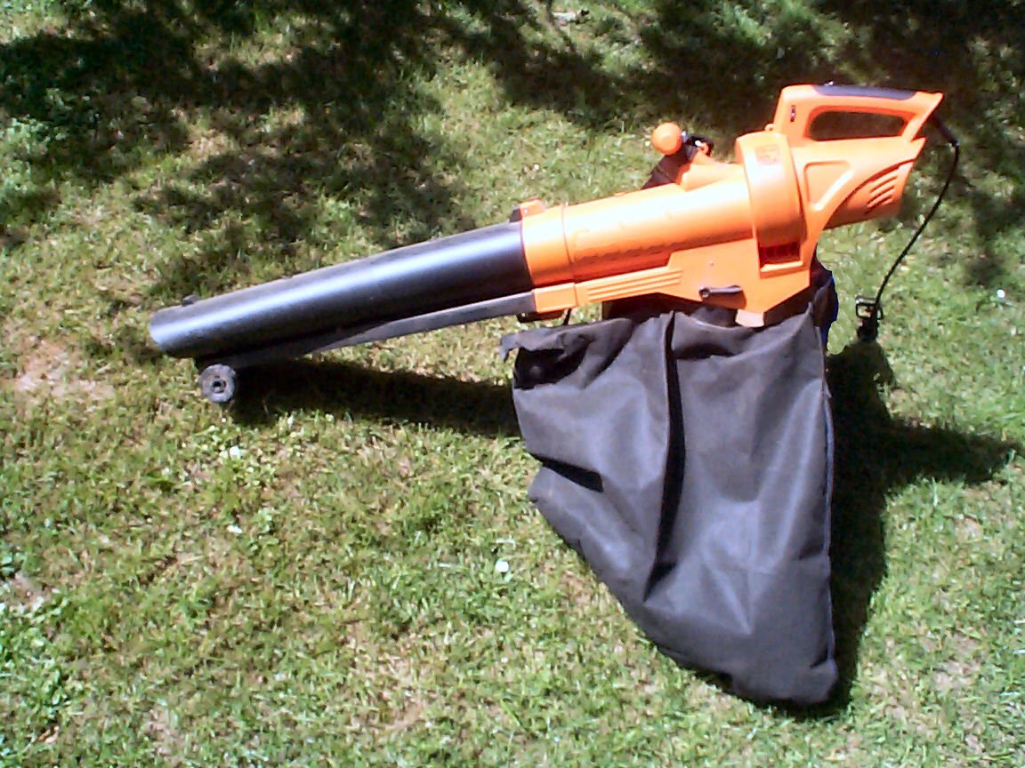 Portable handheld leaf blower vacuum unit