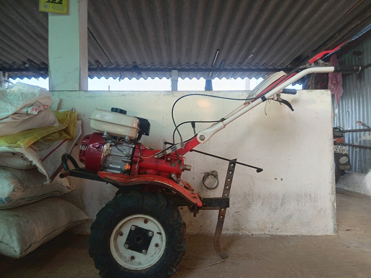 Power tiller or cultivator used for loosening garden soil