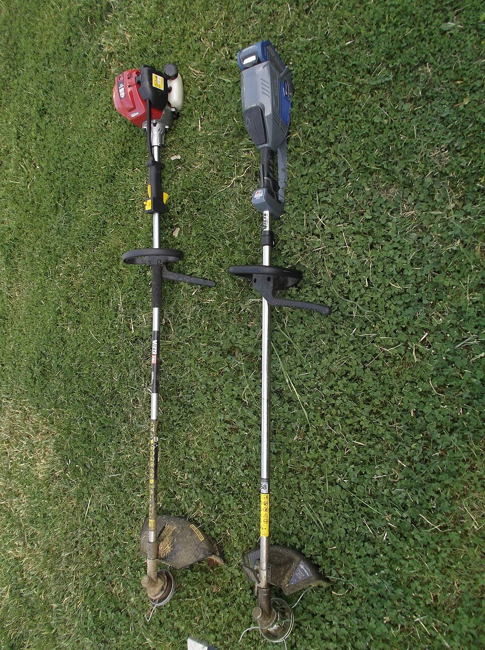 Blue cordless and red gas-powered straight shaft string trimmers shown side by side