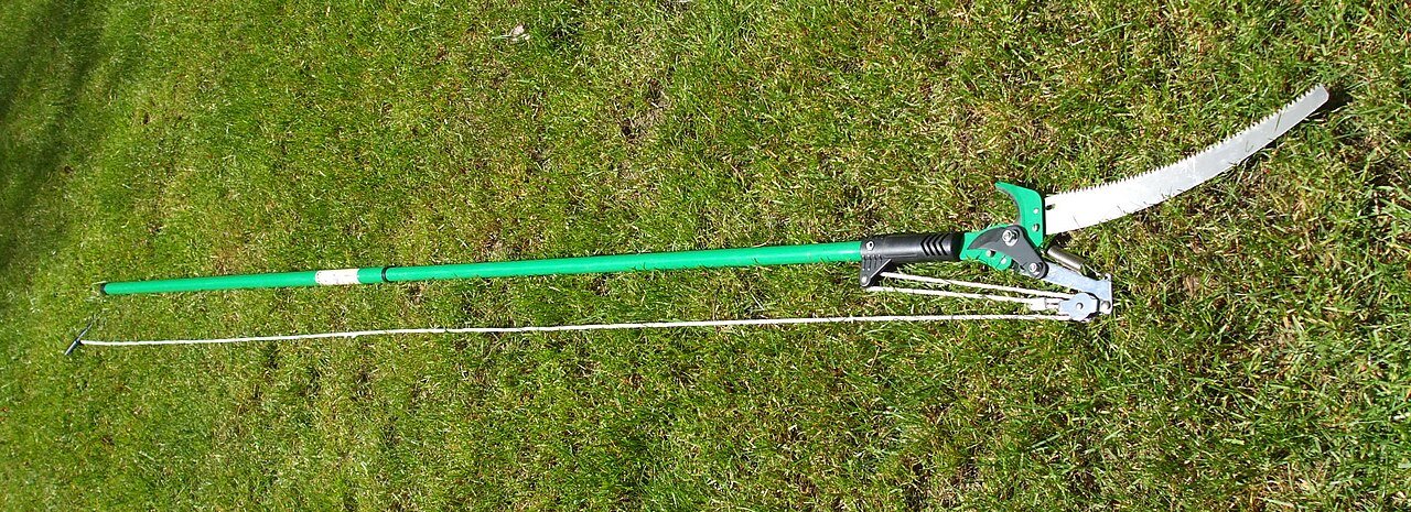 Long telescoping pole pruner with hand-operated cutting head and saw